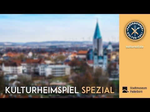 Plakat für das "Kulturheimspiel spezial", ein verschwommenes Bild von Paderborn.
