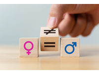 Würfel mit weiblichem und männlichem Symbol und Gleichzeichen